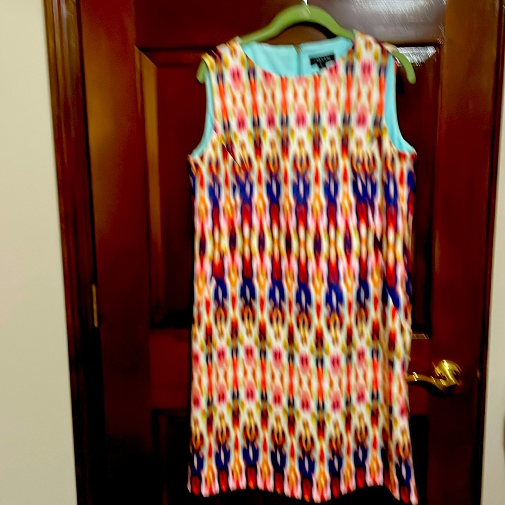 Size 12 Tahari sleeveless dress.multi colored navy, orange, aqua.